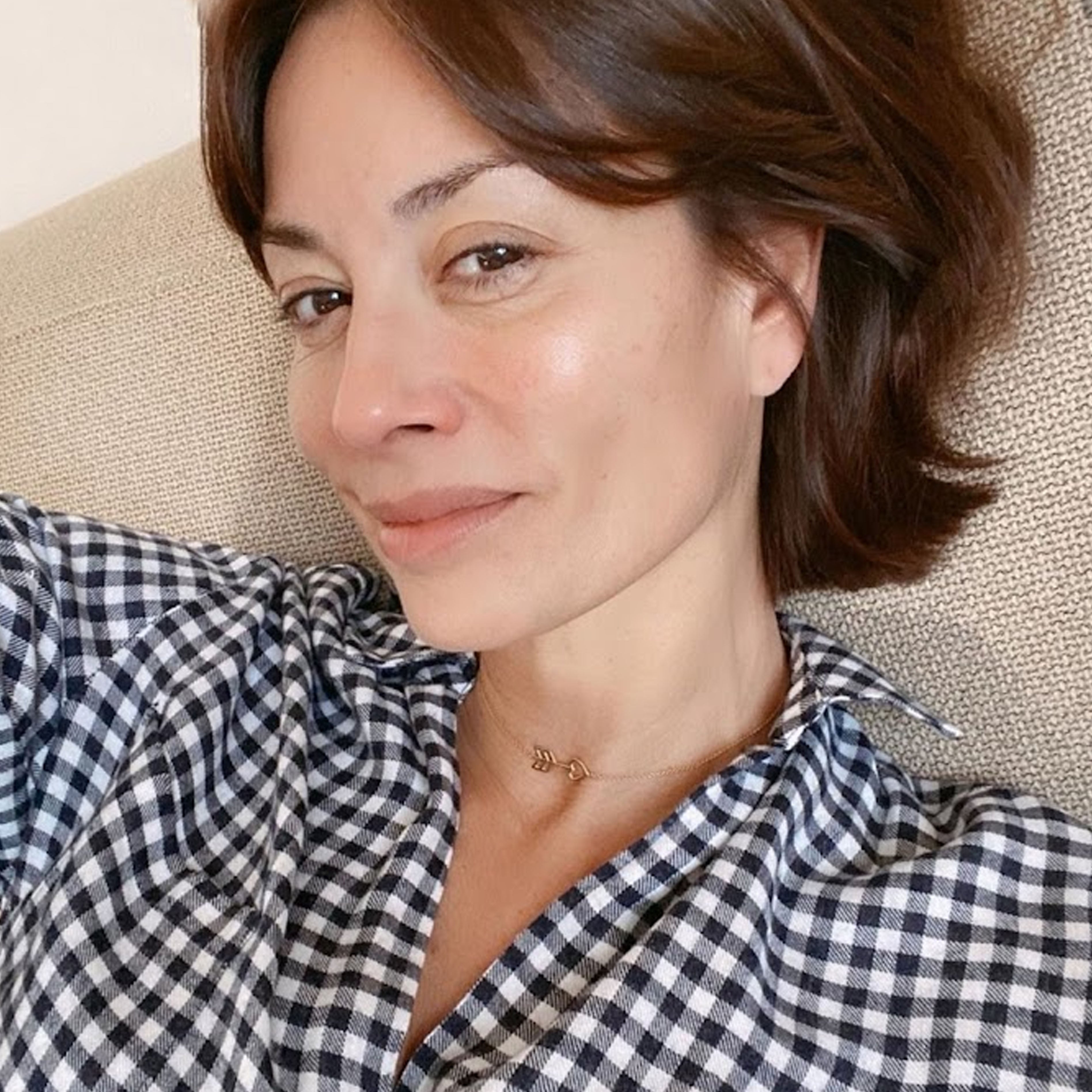 Melanie Sykes wears heart arrow necklace in gold