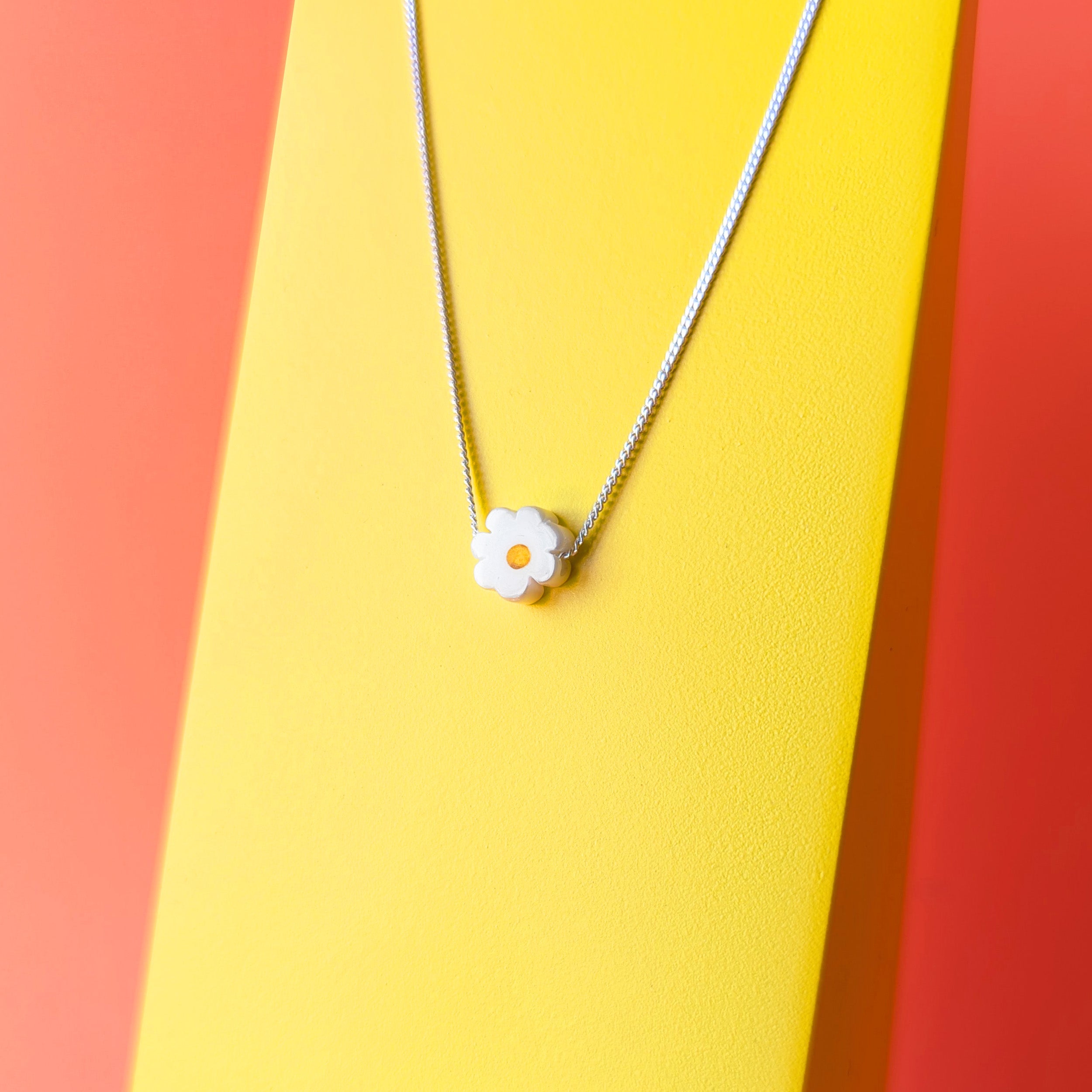 Daisy pendant on fine silver chain