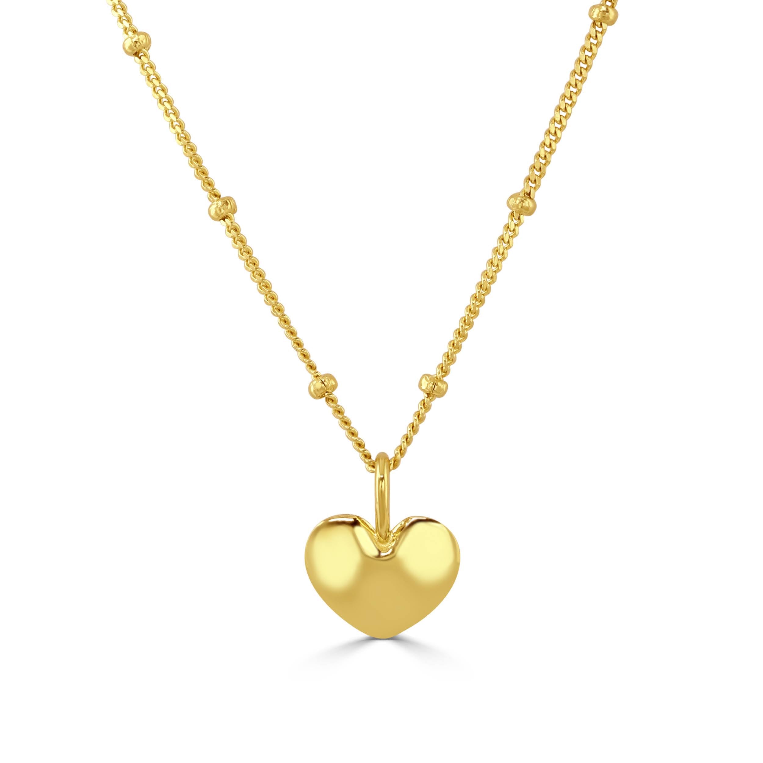 Gold heart pendant on satellite chain 